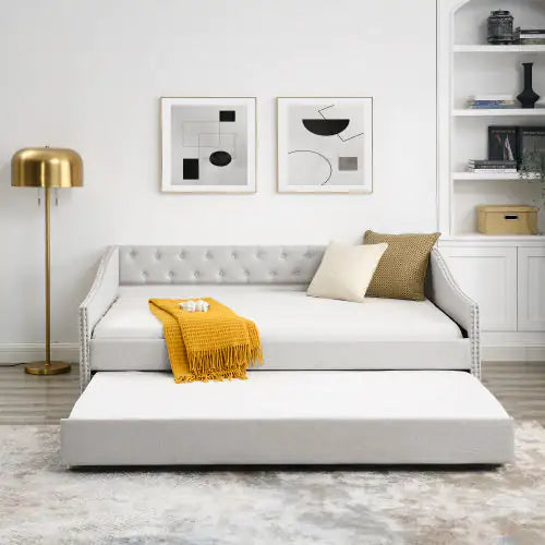 The Full-size Sofa Bed Features A Double Upholstered Tufted Sofa Bed On Wheels